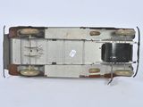 a close up of a toy train on a white surface