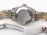 a watch that is sitting on a bracelet