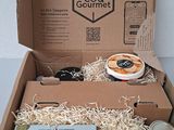 a cardboard box that has some items inside of it