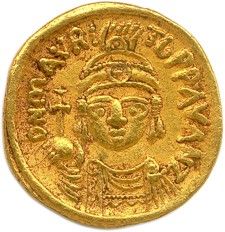 une pièce d'or à l'effigie d'un homme portant un turban