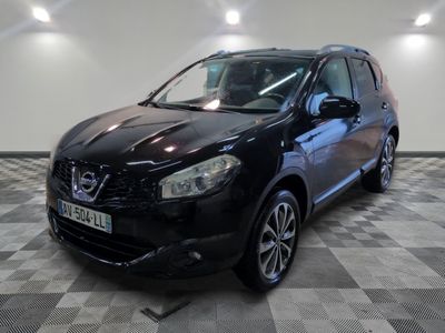 the black nissan qxv is parked on a checkered floor