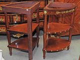 two tables that are next to each other in a room