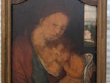 an image of a painting of a woman holding a baby in her arms