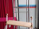 an image of a wooden and metal bird cage