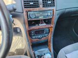 a car dashboard with a radio and other items in it