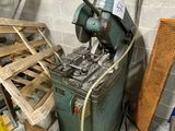 a machine that is sitting in a room with wood pallets