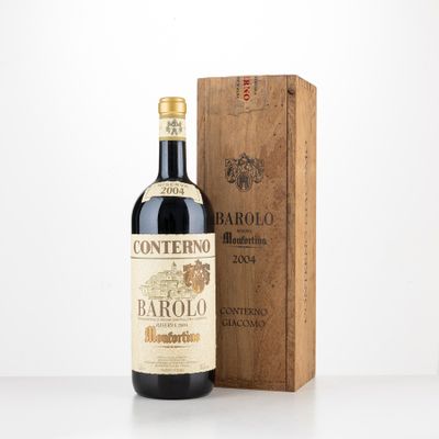 a bottle of wine sitting next to a wooden box