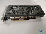 a close up of a video card with a fan on it