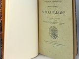 an open book with a picture of a tree on it