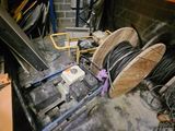 a pile of wires and wires in a room