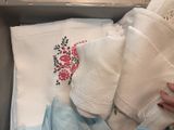 a box with a bunch of towels and towels in it