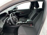 the interior of a car with a steering wheel and a dashboard