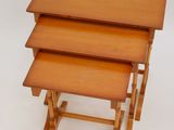 three tables that are stacked on top of each other