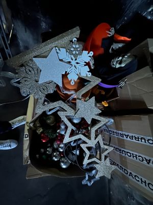 a box full of christmas decorations on a table