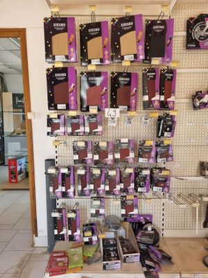 many different types of hair products on display in a store