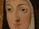 an old painting of a nun with a cross in her hand