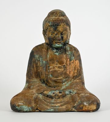 une image représentant une statue de Bouddha assis sur une surface blanche