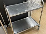 stainless steel utility cart with two baskets on top of it