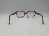 brown and orange glasses on a white surface