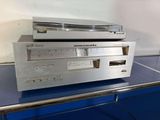an image of a stereo system sitting on top of a blue table