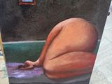 a painting of a woman laying down on the ground