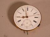 a clock with roman numerals on the face of it