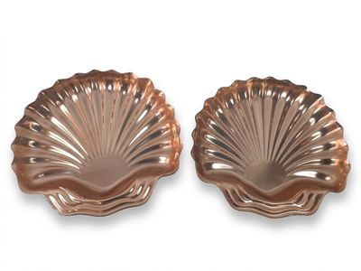 pair of copper shell shaped dishes