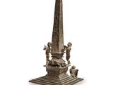 statue représentant un obélisque sur un socle, entourée de personnages
