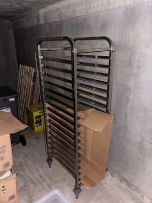 a metal rack that is in the middle of a room