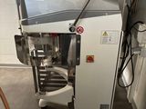 a machine that is sitting in the corner of a room