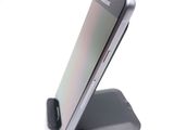 a close up of a cell phone on a stand