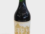 a bottle of wine that is sitting on a table