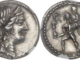 a silver coin with an image of a man holding a sword