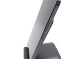 a cell phone that is sitting on top of a stand