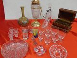 a table with a lot of glass items on it