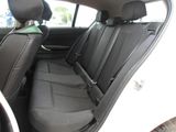 the back seats of a car are black and white in color