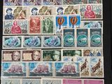 a picture of a collection of stamps from around the world