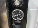 a close up of a black control panel on a wall