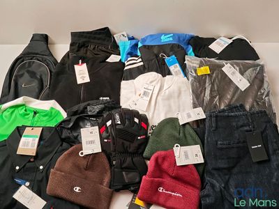 a pile of clothing that is sitting on a table