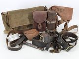 a lot of leather items that are on the table