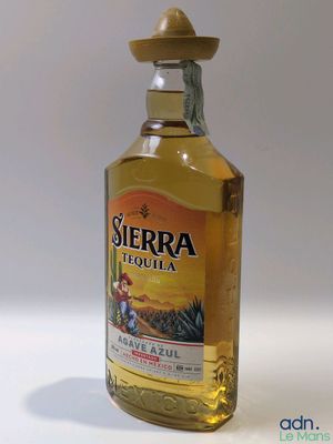 a bottle of liquor that is sitting on a table
