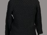 un pull noir sur un mannequin, un mannequin, un mannequin, un mannequin, un mannequin, un mannequin, un mannequin, un mannequin, un mannequin