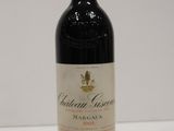 a bottle of wine that is sitting on a table