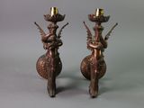pair of antique bronze candlesticks with angels on them
