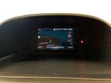 a picture of a car dashboard with a digital display