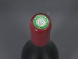 a bottle of wine that is sitting on a table
