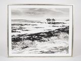 black and white photograph of two people riding horses in the ocean