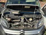a car that has its hood open with the hood up