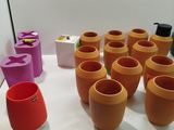 many pots that are sitting on a table