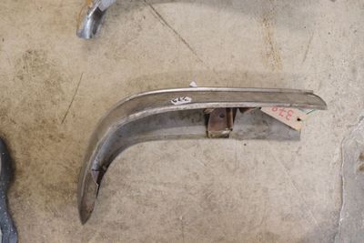 two pieces of metal that are sitting on the floor